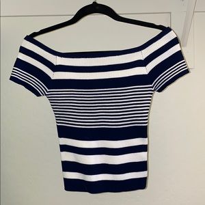Off the shoulder, navy blue and white top.